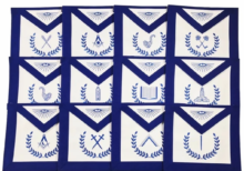 Masonic Blue Lodge Officers 12 Machine Embroidered Apron Set - Worshipful MasteråÊ - Senior WardenåÊ - Junior WardenåÊ - TreasureråÊ - SecretaryåÊ - Senior DeaconåÊ - Junior Deacon - Senior StewardåÊ - Junior Steward - Tyler / Tiler / Outer Guard - Inner Guard or Inside SentinelåÊ - ChaplainåÊ Features: Blue Lodge Set of 12 Adjustable belt with Silver plated snakeåÊfitting Finest quality royal blue ribbon Finest Quality Machine Embroidery Complete color shade Guarantee Pocket at the rear and soft padding Size: 14‰۪‰۪åÊX 16'' Available in Imitation Leather and Lambskin